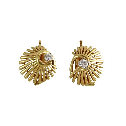 Pair of gold and diamond earrings by Cartier, New York, of radiating wirework fan shape,